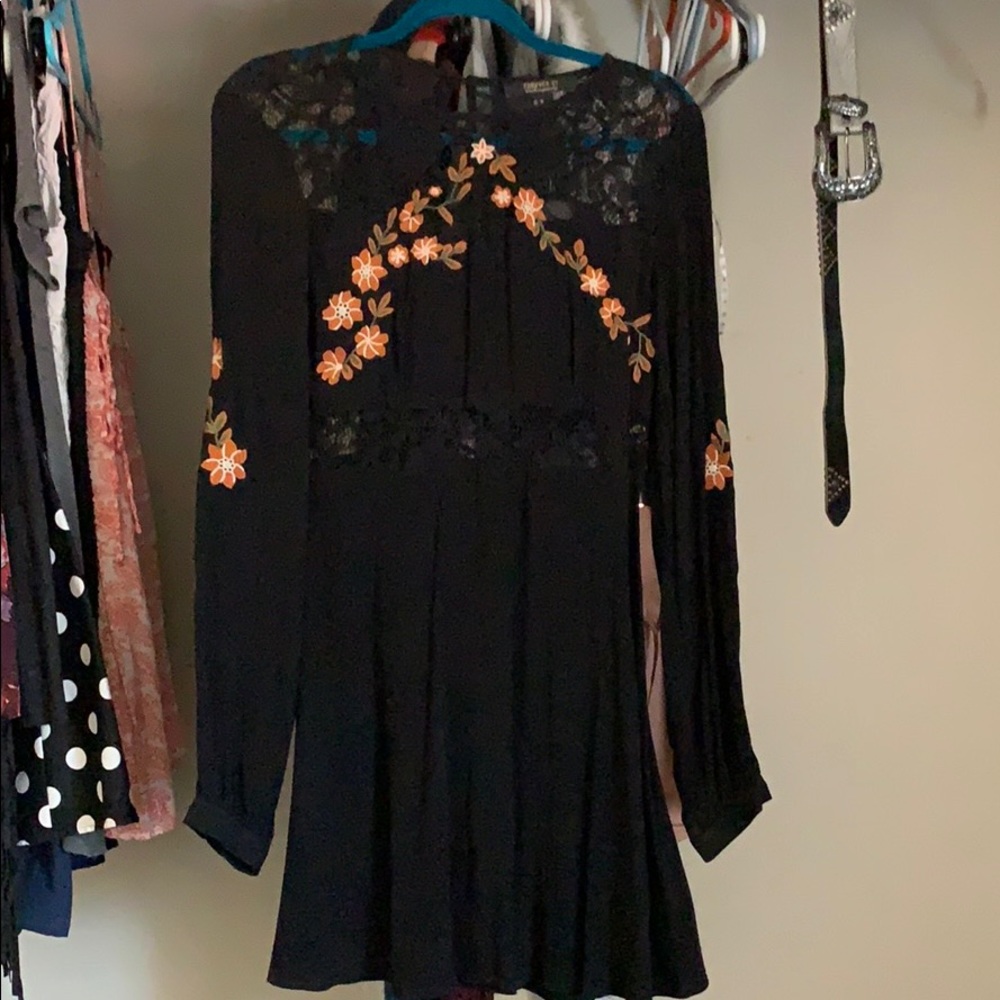 Black sun dress with orange embroidered flowers